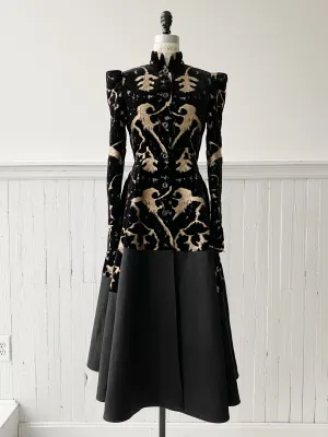 muse of capitalism coat